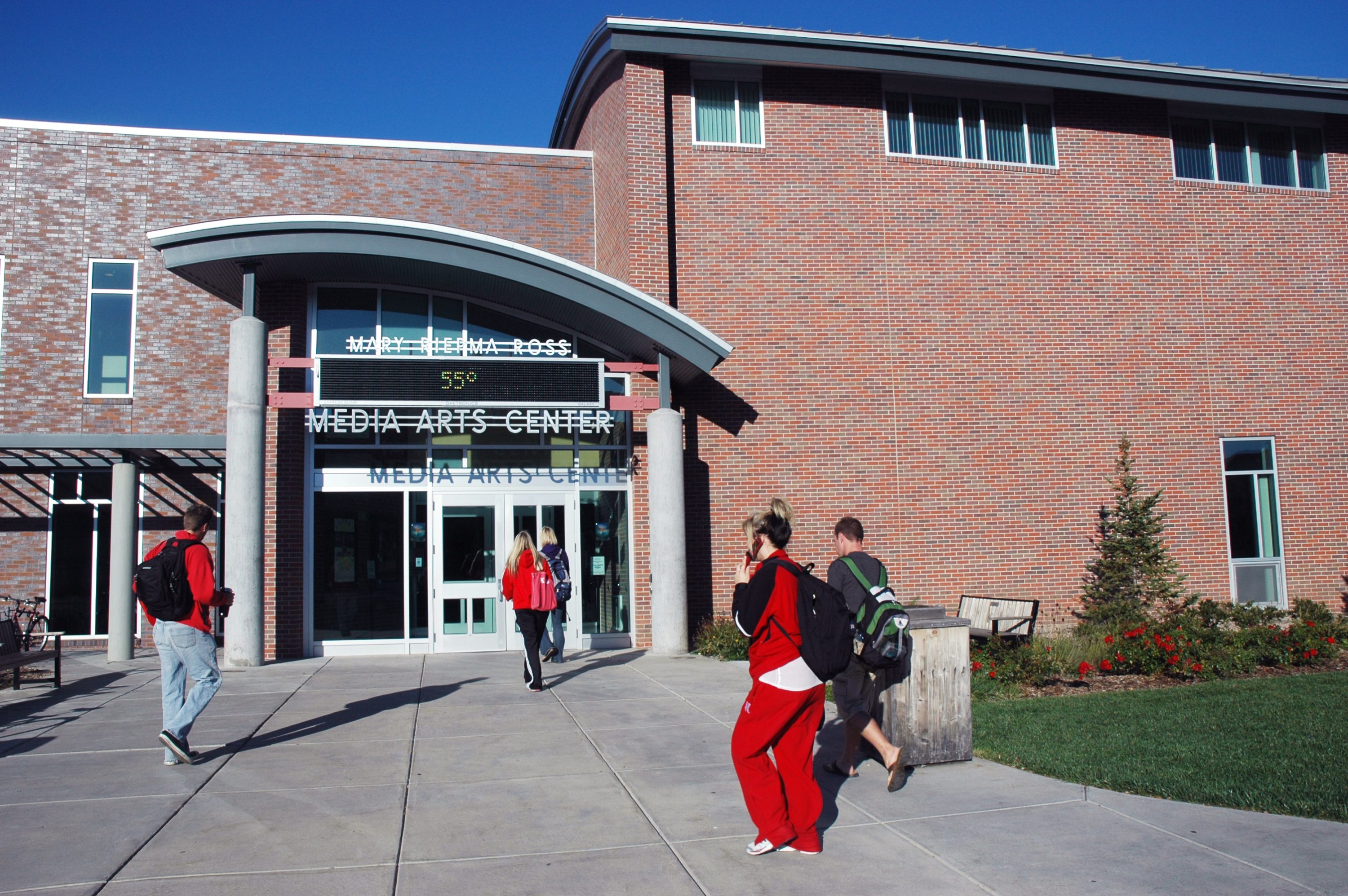 Front entrance of the Media Arts Center, Students walking up to the door