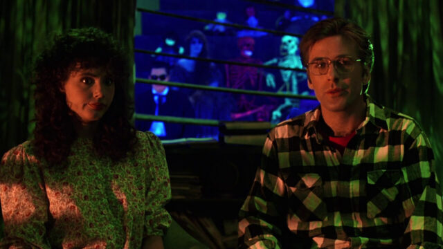 Geena Davis and Alec Baldwin in a scene from Beetlejuice.