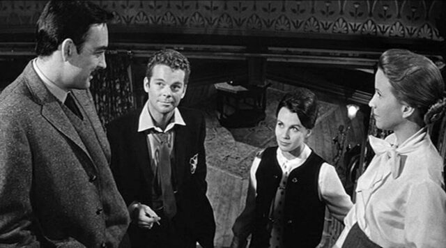 Richard Johnson, Russ Tamblyn, Claire Bloom, and Julie Harrris in a scene from The Haunting.