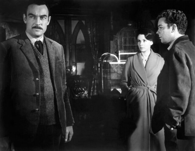 Richard Johnson, Claire Bloom, and Russ Tamblyn in a scene from The Haunting.