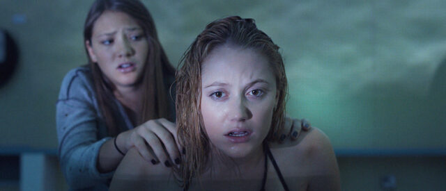 Closeup of Maika Monroe in a scene from It Follows.